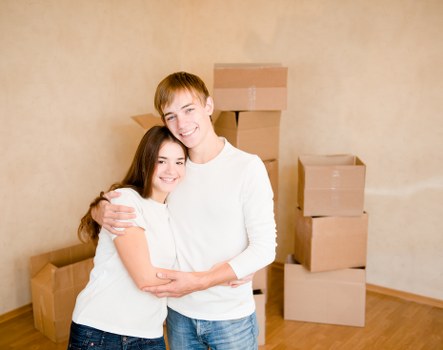 Packed office boxes and furniture ready for relocation in Soho